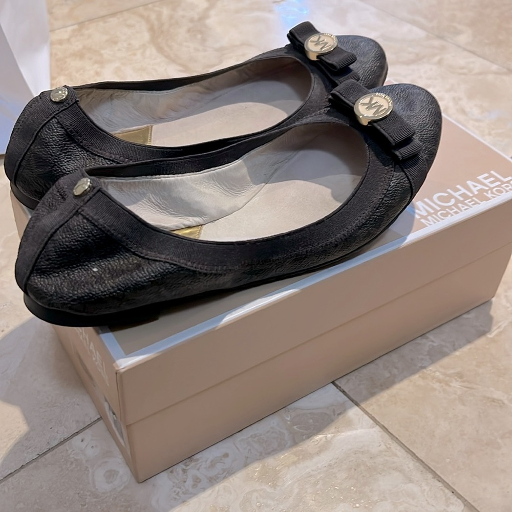 Michael Kors brown ballet shoes. Size 7 but runs small.